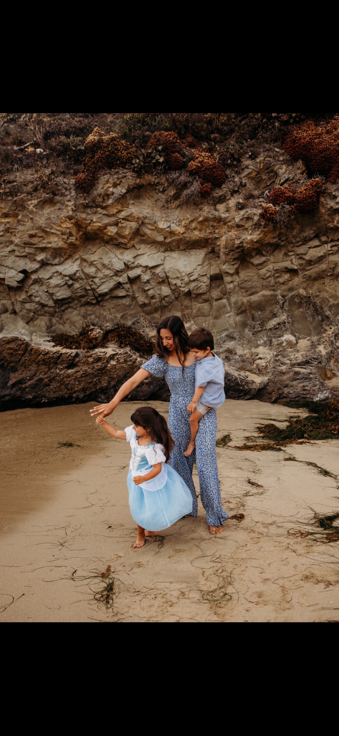 Maheen with her children at the beach